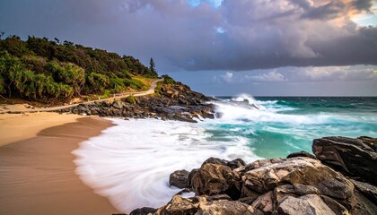 Dramatic Coastal Scene - Waves Crashing Against Rocky Shoreline Under Stormy Sky.