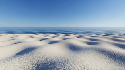 Vast sandy dunes meet the calm blue ocean under a clear sky