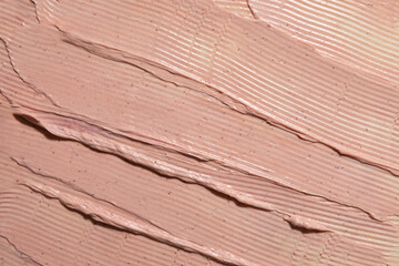 Texture of Freshly Applied Pink Plaster on a Wall Surface