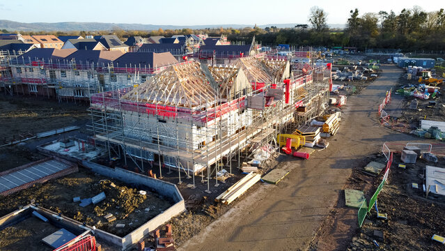 Aerial view of houses being built on a new estate. 