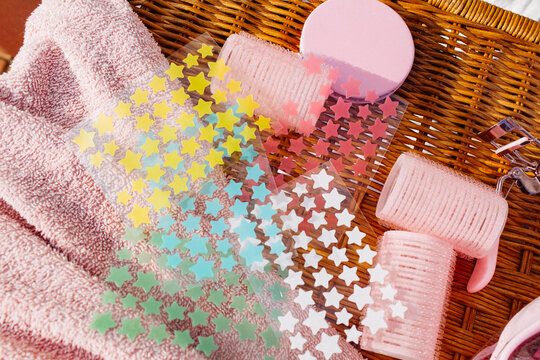 Pimple patches in the form of multicolored stars lie on the table 