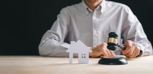 Foreclosure house real estate law, bankruptcy property auction concept, judge gavel and home model, person conducts legal mortgage sale, attorney manages debt division