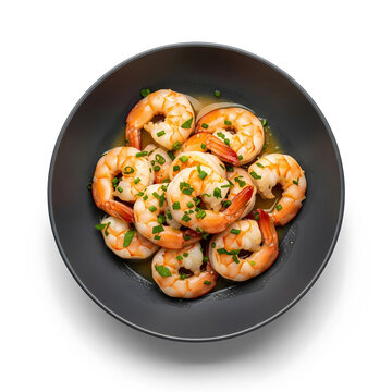 Shrimps pn black plate top view isolated on a white or transparent background.