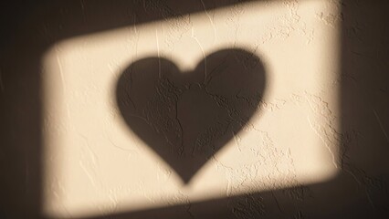 Heart shape shadow on textured wall