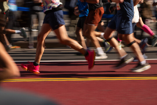 Group of runners in colorful outfits