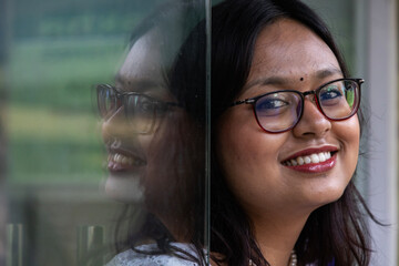Portrait of a cheerful and happy young Indian woman