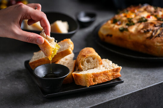 Homemade Sourdough Focaccia with vegetable and herb art on it