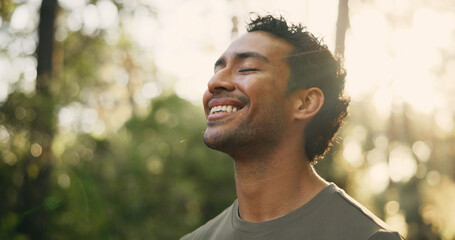 Thinking, smile or man in nature with hiking, fresh air or inspiration on trekking journey....