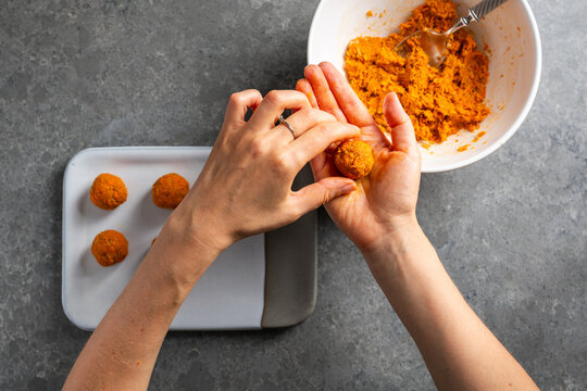 Making raw organic carrot cake balls