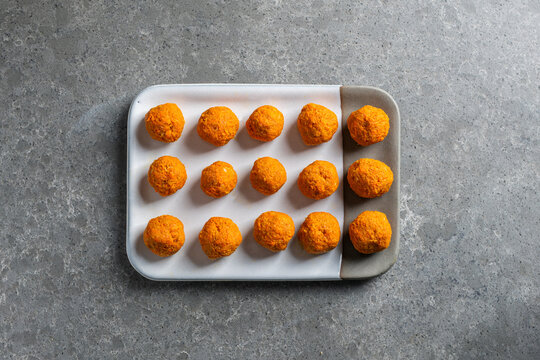 Making raw organic carrot cake balls