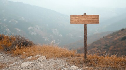 Wooden signpost on a mountain trail