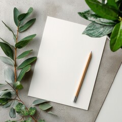 marketing document mockup with pencil and foliage