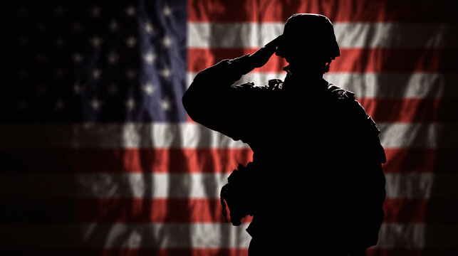 A silhouette of a soldier saluting in front of the flag. This image evokes patriotism and respect for those who serve