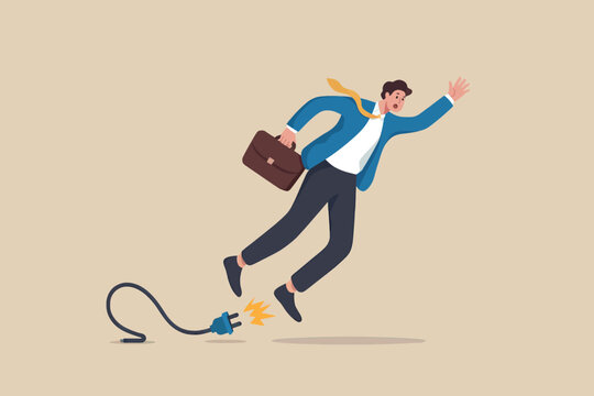Businessman tripping over an unplugged power cord causing a sudden interruption and fall