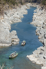 Landscape view of Oboke Gorge, Tokushima, Japan, the famous sightseeing of Iya Valley with turquoise water river and sightseeing boat