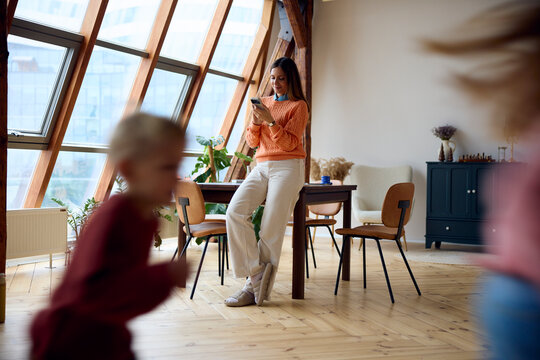 Mother and her children at home