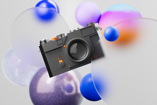 3D render of vintage camera with colorful abstract spheres