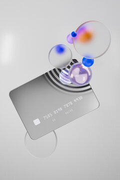 3D render of stacked credit cards with abstract spheres