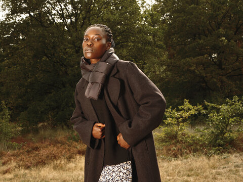 Elegant Black woman in Autumn outfit 