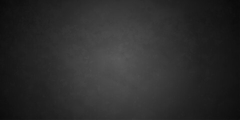 Dark charcoal grunge wall texture background. Dark black rough grunge surface with smoke edge. Black texture chalk board and black board. © MDFAIMIDULISLAM