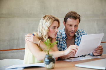 Couple, documents and discussion with finance in home, review and wealth planning with investment....