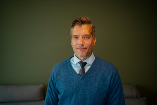 Confident mature businessman posing for a portrait
