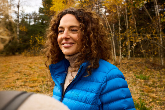Woman smiling while in nature