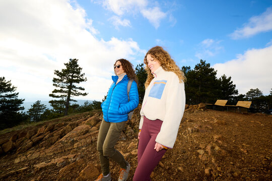 Women sloping down the mountain
