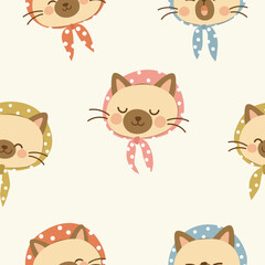 seamless Siamese cat heads with polka dot headscarves pattern on pale yellow background , vector , illustration