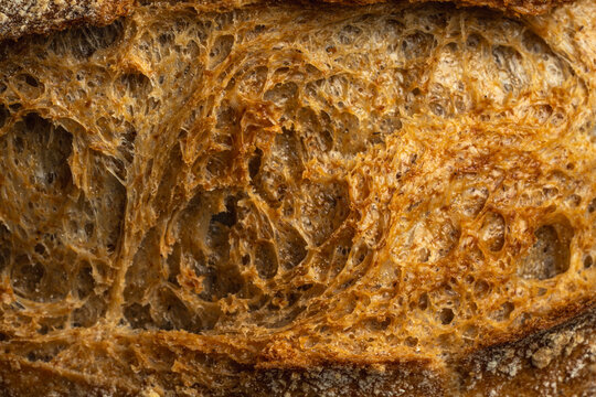 Detailed texture of artisan bread crust and crumb