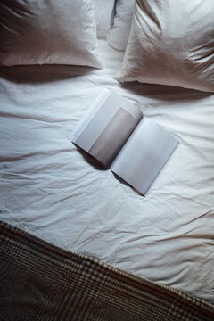 Blank Magazine on Empty Bed