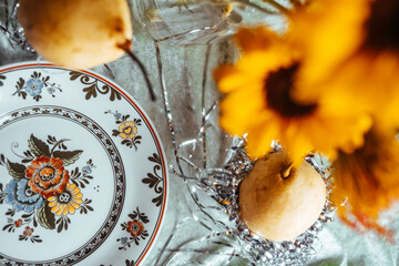 Elegant tabletop setting with fruits and flowers