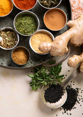 Different aromatic spices in bowls.