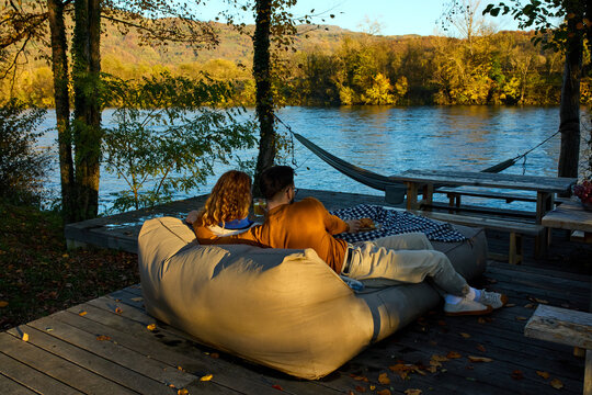Couple is having relaxing time by the river