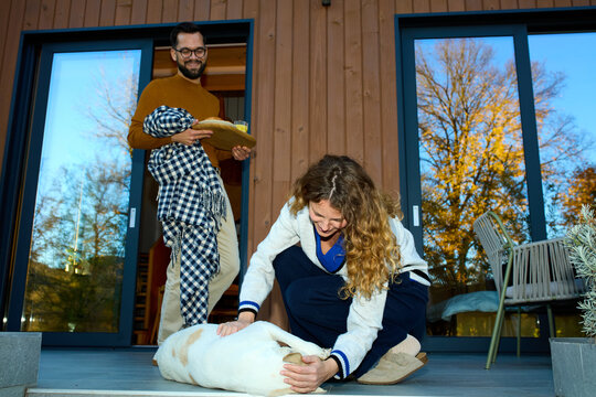 Couple having fun on the porch