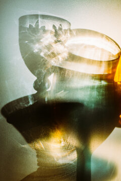 Abstract reflections of glassware in soft light