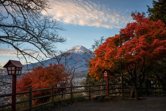 Mount Fuji peak with autumn momiji foliage in Japan