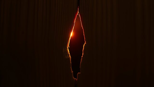 gamestop. A thin golden light from a crack in dark wood, suggesting hidden space. travel magazines, destination branding, designed for travel destination branding, used by product managers.