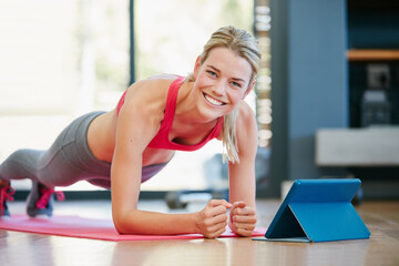 Plank, portrait and woman in house with tablet, video tutorial and streaming in online class. Fitness, health guide and exercise in home with tech, wellness or performance routine on digital app.