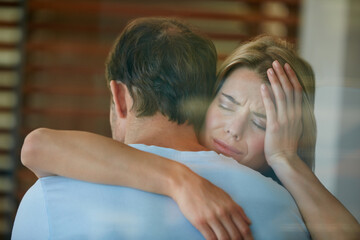 Sad, woman and couple in home, hug and comfort for partner, grief and empathy for bad news and...