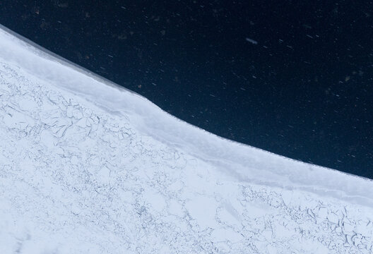 Aerial top down View of Ice and Water Border