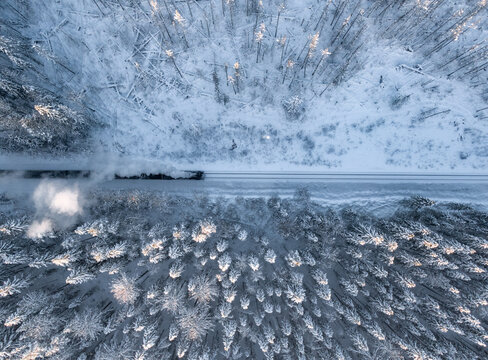 Beautiful Snow-Covered Landscape With Train Tracks in Winter