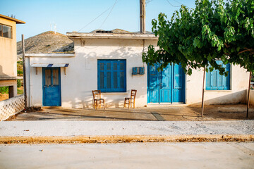 Charming white house with blue trim