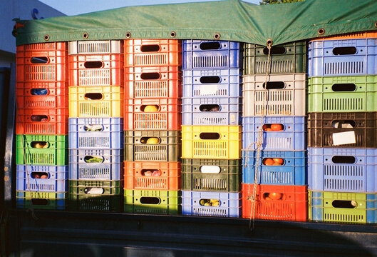 Colorful Crates Stacked Together in an Outdoor Setting