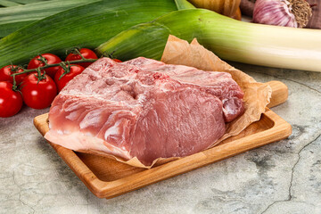 Raw pork loin cut with bone