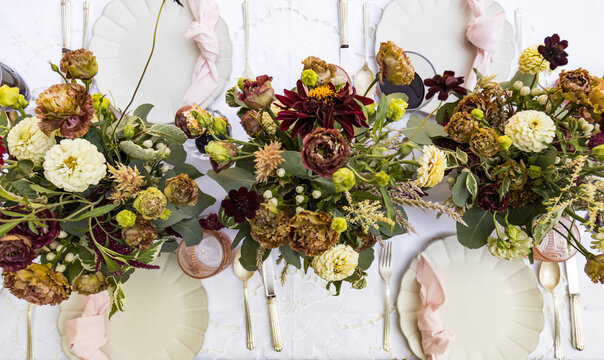 Elegant Table Setting With Floral Centerpieces for a Special Occasion