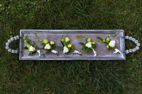 Traditionally Styled Floral Arrangement on a Rustic Tray