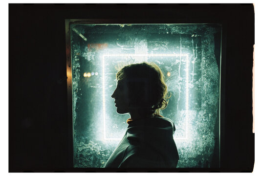 Silhouette of a person at night