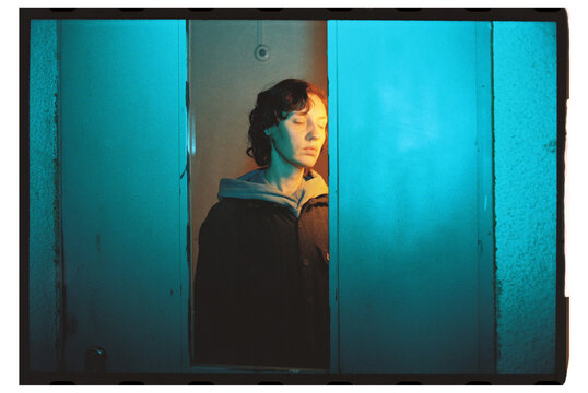 Portrait of a Woman in a Window