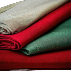 Stacked fabric layers, varying colors and textures